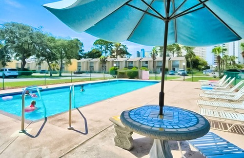 Panama City Beach House | Dog-friendly townhouse with patio, W/D, hot tub, heated pool, gym, & tennis