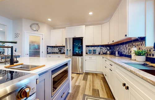 Port Ludlow House | Dog-friendly water view home with private beach, firepit, kayaks, deck, & grill