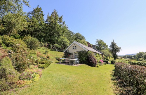 Trefeglwys Cottage | DOLGENAU HIR - THE BARN, pet friendly, with open fire in Trefeglwys