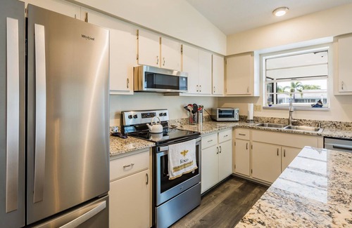 Marco Island House | DOLPHIN BUNGALOW! Remodeled water front getaway in the heart of Old Marco