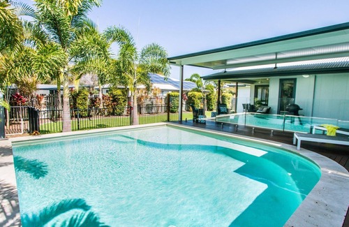 Agnes Water House | Dolphin Cove Agnes Water holiday home with pool & boat parking