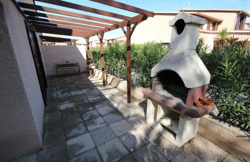 Portiragnes-Plage Villa | Domaine de vacances à 600m de la plage villa d'angle, climatisée, grande terrasse 3 chambres 7 couchages WIFI animations et piscines en supplément LRPDSO7