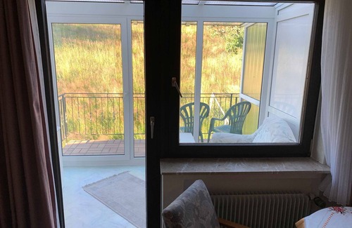 Reichelsheim Cottage | Doppelzimmer mit Wintergarten - 33 - Gasthaus und Pension Zum Fürstengrund