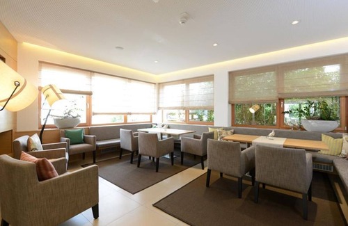 Seeboden House | Doppelzimmer Kirschblüte Frühstück - Hotel Moserhof