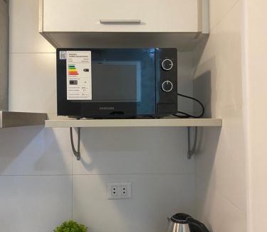 Asuncion House | Dormitorio con baño en Casa Residencial