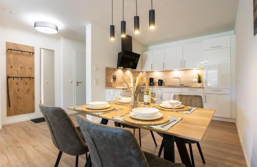 Dorumer Neufeld Apartment | Dorumer Seestern - Ferienwohnung mit Terrasse und Sauna