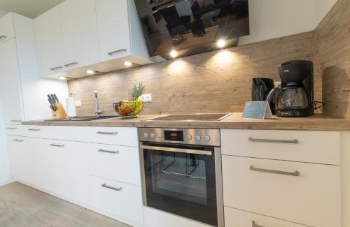 Dorumer Neufeld Apartment | Dorumer Sielhuus 13 mit Sauna und Balkon
