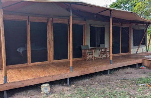 Mikumi House | Double G safaris and Camp Mikumi - Luxury Triple Room 4