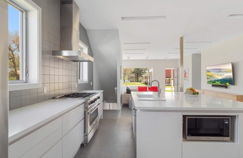 Douglas House | Douglas Modern Villa - Steps to downtown | Game RM | Backyard Oasis