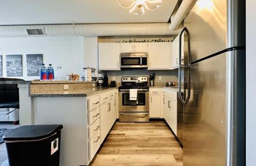 Mile Square House | Downtown 2BR Penthouse Suite with Balcony and Direct Skybridge Access
