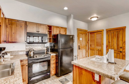 Peak 9 Condo | Downtown, 3rd-floor condo next to Peak 9 base with hot tubs, pool & fireplace