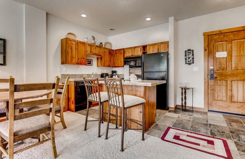 Peak 9 Condo | Downtown, 3rd-floor condo next to Peak 9 base with hot tubs, pool & fireplace