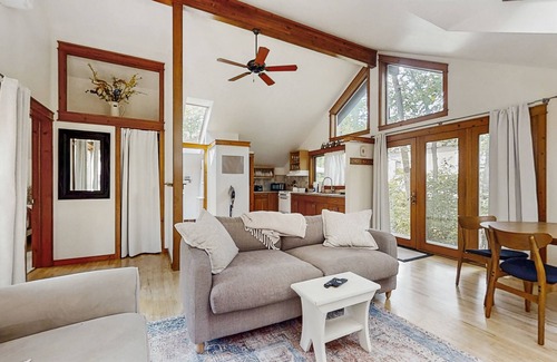 Glen Arbor Cottage | Downtown cottage with nearby beach access, a grill, deck, & washer/dryer