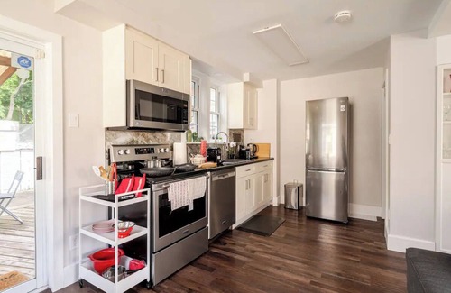 Kitchener House | Downtown House: Patio - Fire Pit - Lawn Chairs