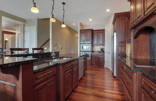 Chetek House | Downtown Lakefront Home on Lake Chetek w/hot tub & pontoon & jet ski rental