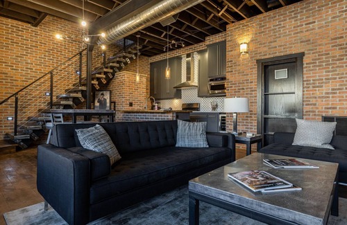 Cody House | Downtown Loft- industrial modern loft-style penthouse with rooftop deck!