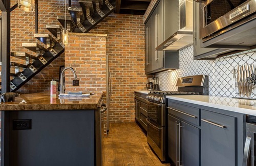 Cody House | Downtown Loft- industrial modern loft-style penthouse with rooftop deck!