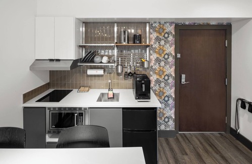 Downtown Juneau Apartment | Downtown Penthouse King Suite, Kitchenette, Free Breakfast, and Rooftop Hot Tub!