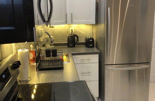 Downtown Niagara Falls Apartment | Dreamwood- Private Niagara Falls Escape