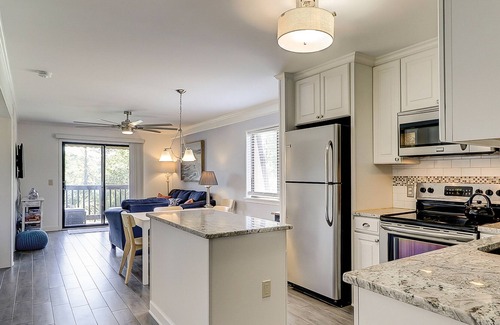 Folly Field Condo | Dreamy beach condo with shared pool & tennis courts, easy beach access & balcony