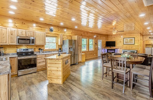 Bryson City House | Dreamy dog-friendly log cabin with free WiFi, covered deck, foosball, & A/C