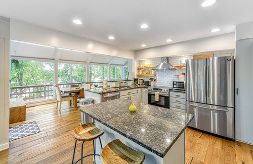Livingston House | Dreamy lakefront gem on wooded property with private beach, dock & fast WiFi