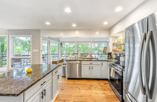 Livingston House | Dreamy lakefront gem on wooded property with private beach, dock & fast WiFi