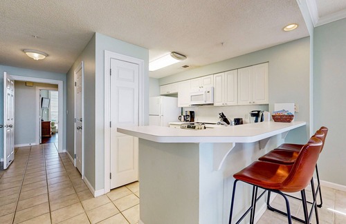 Navarre Beach Condo | Dreamy Navarre Getaway w/Shared Pool/Hot Tub, Corner Location & Private Balcony