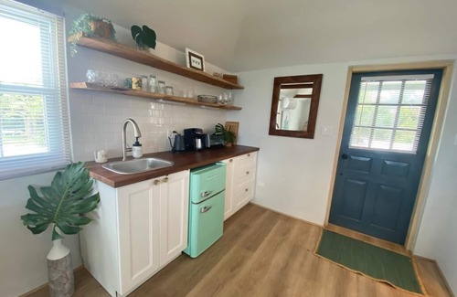 Somerset Village Apartment | Dreamy studio 30 seconds from the beach, includes kayak and bicycles!