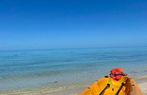 Somerset Village Apartment | Dreamy studio 30 seconds from the beach, includes kayak and bicycles!