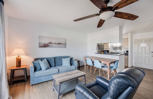 Port Aransas Condo | Drink your morning coffee on the deck watching the ships pass by.