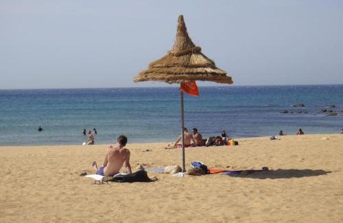 Achakkar Apartment | Duplex bord de mer - Arous Al Bahr