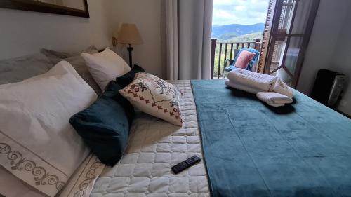 Alto do Capivari Apartment | Duplex em Castelo | Piscina Aquecida, Lareira e Wi-Fi