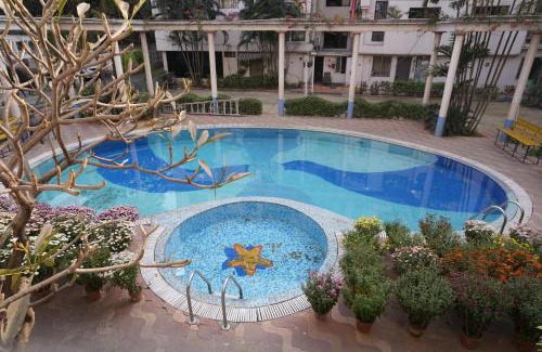 Behala Apartment | Eastern Elegance by JadeCaps3BHKAlipore