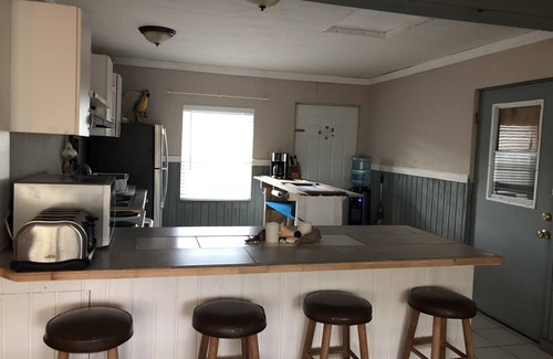 Gregory Town House | Easy-1 Rental/Caribbean View Cottage