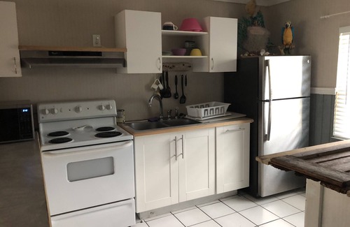 Gregory Town House | Easy-1 Rental/Caribbean View Cottage