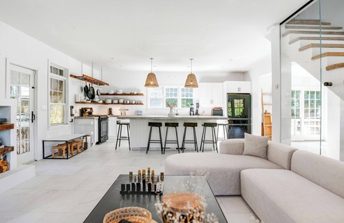 Montauk House | Eclectic-style home with private pool, fitness studio, open-floor plan,.