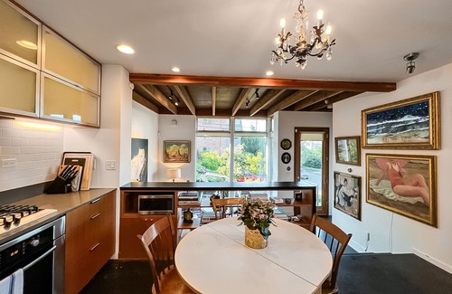 Mann House | Eclectic townhouse with balcony, enclosed yard, full kitchen, & W/D