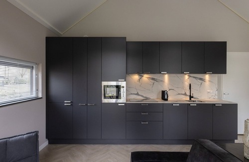 Oirschot House | Eco Villa in Latour by Scenic Pond