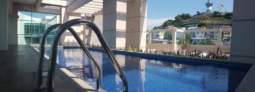 Puerto Santa Ana Apartment | Ecusuites Riverfront l Balcony