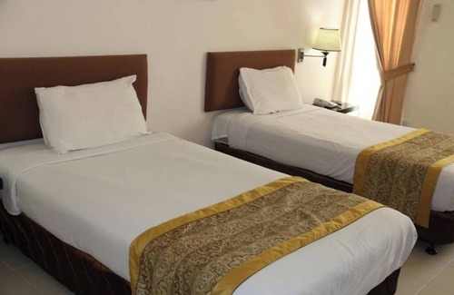 Sintuk Hotel | EDC Hotels & Resorts