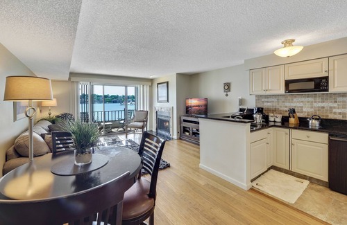 Charlevoix Condo | Edgewater Inn Condo with Waterfront Views | Pool, Hot Tub, Sauna | Sleeps 4