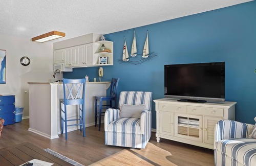 Charlevoix Condo | Edgewater Inn Condo #117C with Waterfront Access | Pool, Hot Tub, Sauna