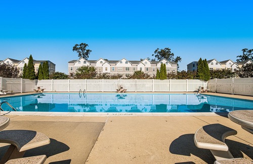 Rehoboth Beach House | Edgewater Park townhome with pool, patio, grill, balcony, AC & beach gear