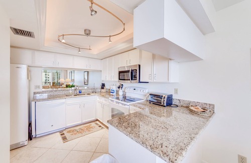 Vanderbilt Beach Condo | Eighth-story, beach-view condo with a pool, tennis, AC & washer/dryer