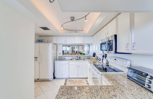 Vanderbilt Beach Condo | Eighth-story, beach-view condo with a pool, tennis, AC & washer/dryer