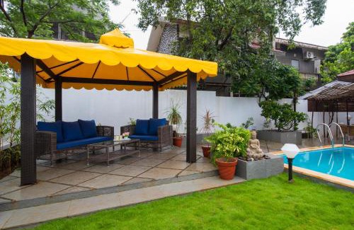 Kune N.m. Villa | EL Lodge by StayVista - Pool, lawn, and a charming gazebo for your perfect getaway