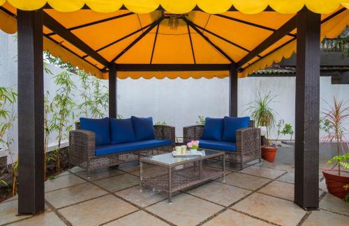 Kune N.m. Villa | EL Lodge by StayVista - Pool, lawn, and a charming gazebo for your perfect getaway