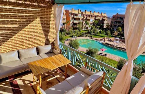 Agdal Apartment | Elegant 2-BR Oasis with Terraces & Pool view