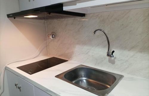 Mlati Apartment | Elegant and Spacious 1BR at Patraland Amarta Apartment By Travelio